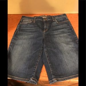 Bermuda length jean shorts.